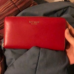 Kate Spade New York zip around continent